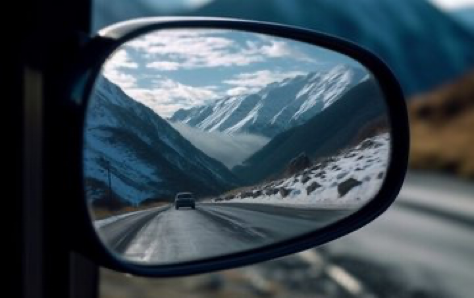 Ultra closeup shot of a rearview mirror, Captures the reflection of snow mountains, perspective Photography, precise angle, sharp and detailed,...