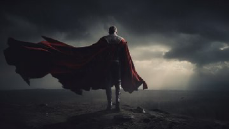 a superhero with a long cape facing the sky, aetherpowerpunk style, epic surrealism, archival photo, whirlwind, imaginative characters, dark and...